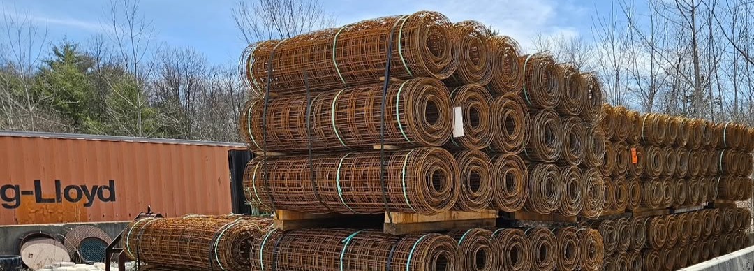 Rolls of welded wire mesh in the yard
