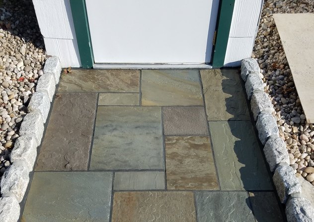 Full color pattern bluestone landing edged with granite Belgian block