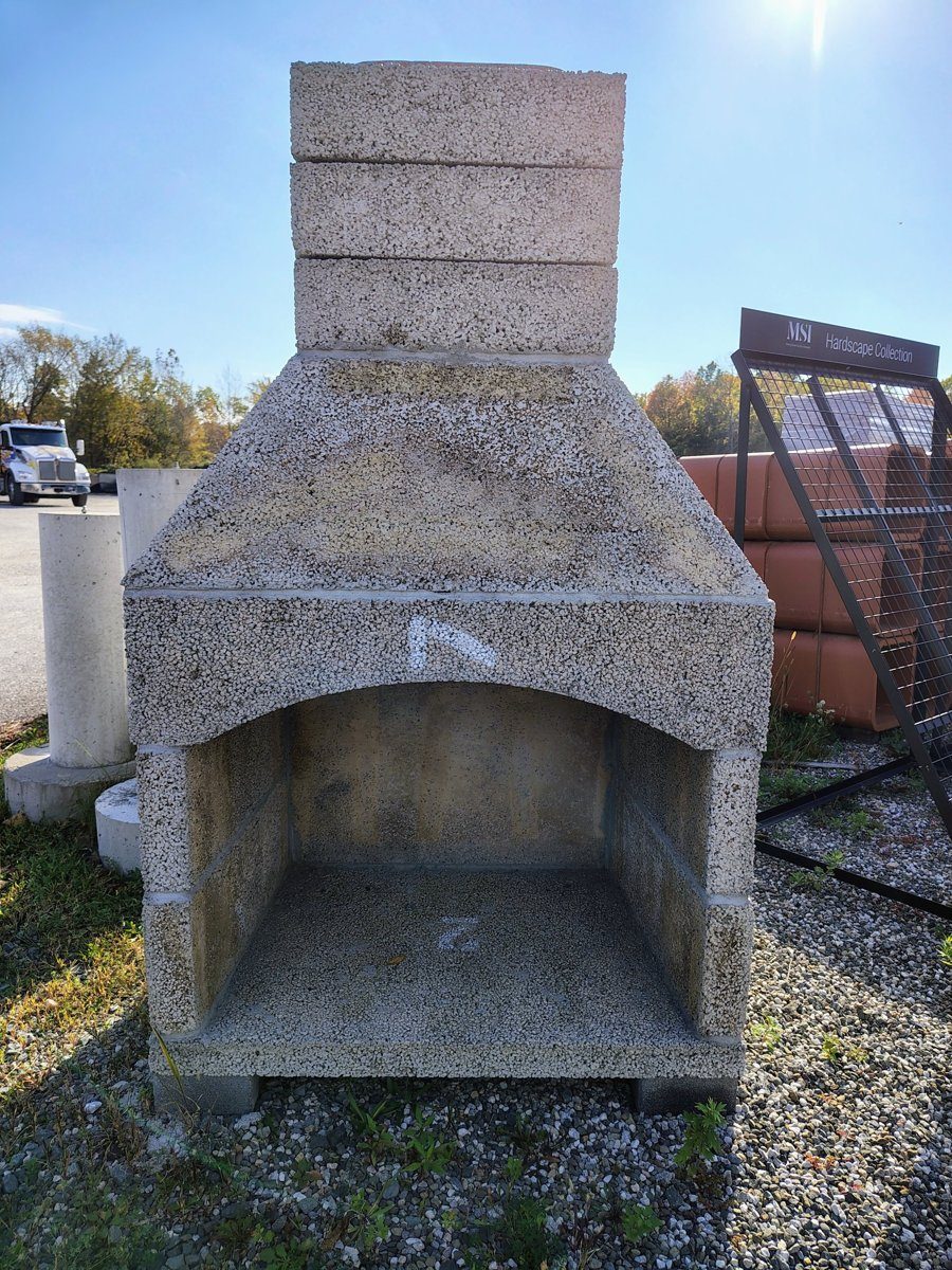 Assembled Stone Age outdoor fireplace kit in the Orange County Mason Supply yard
