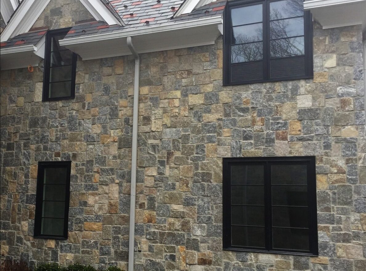 Home exterior clad in R Stone square and rectangular natural thinstone