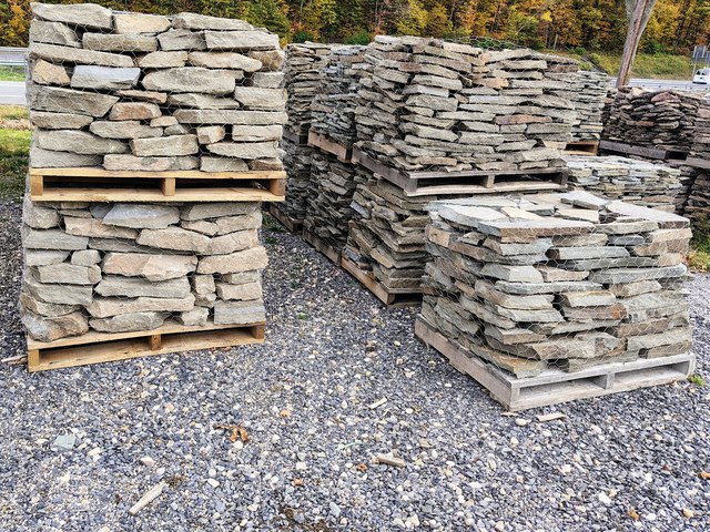 Pallets of bluestone colonial wall