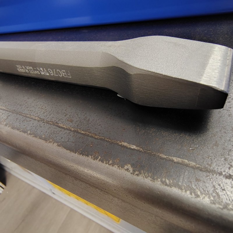 Close-up of a carbide-tipped mason chisel