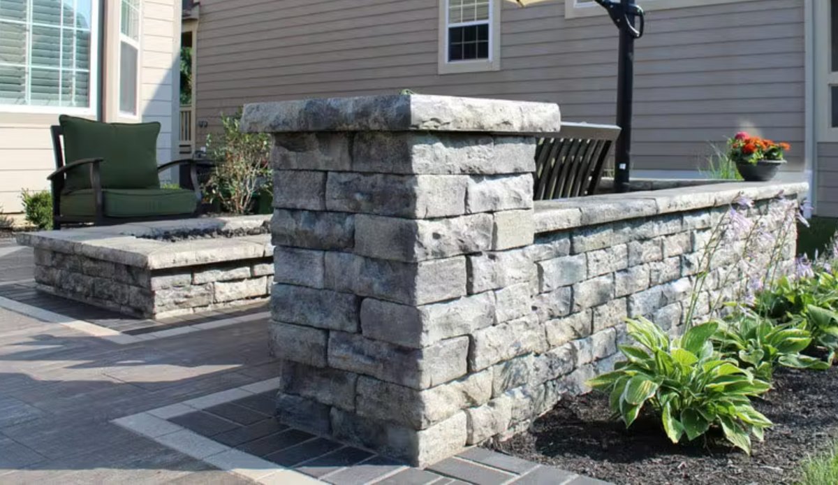Rosetta Dimensional Wall seat wall and capped pillar on a paver patio